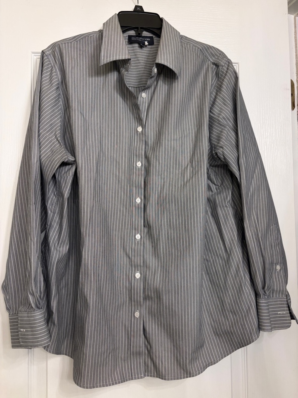 Jones New York stripped button down shirt.
